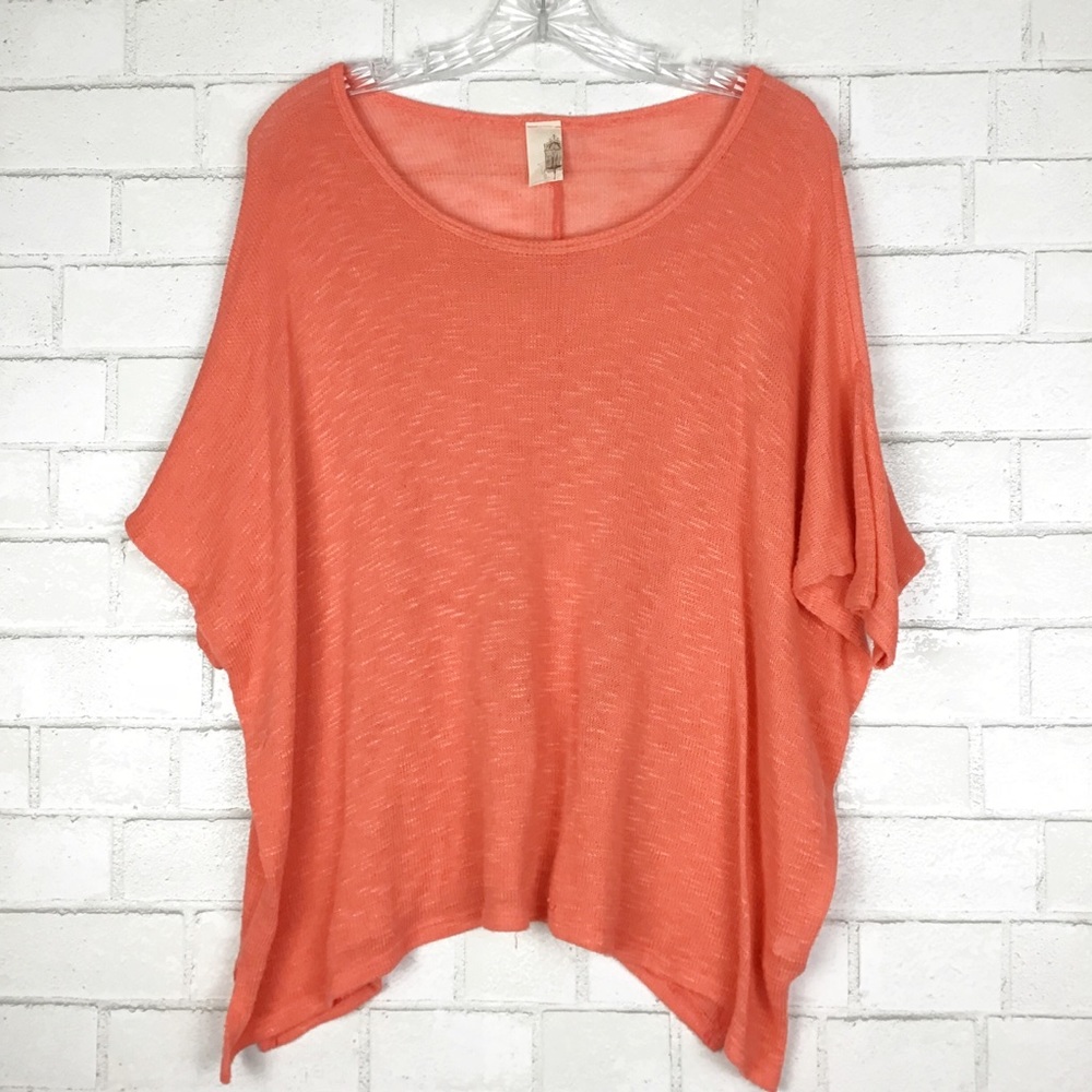 Anthropologie brand Francesca’s Orange Knit top